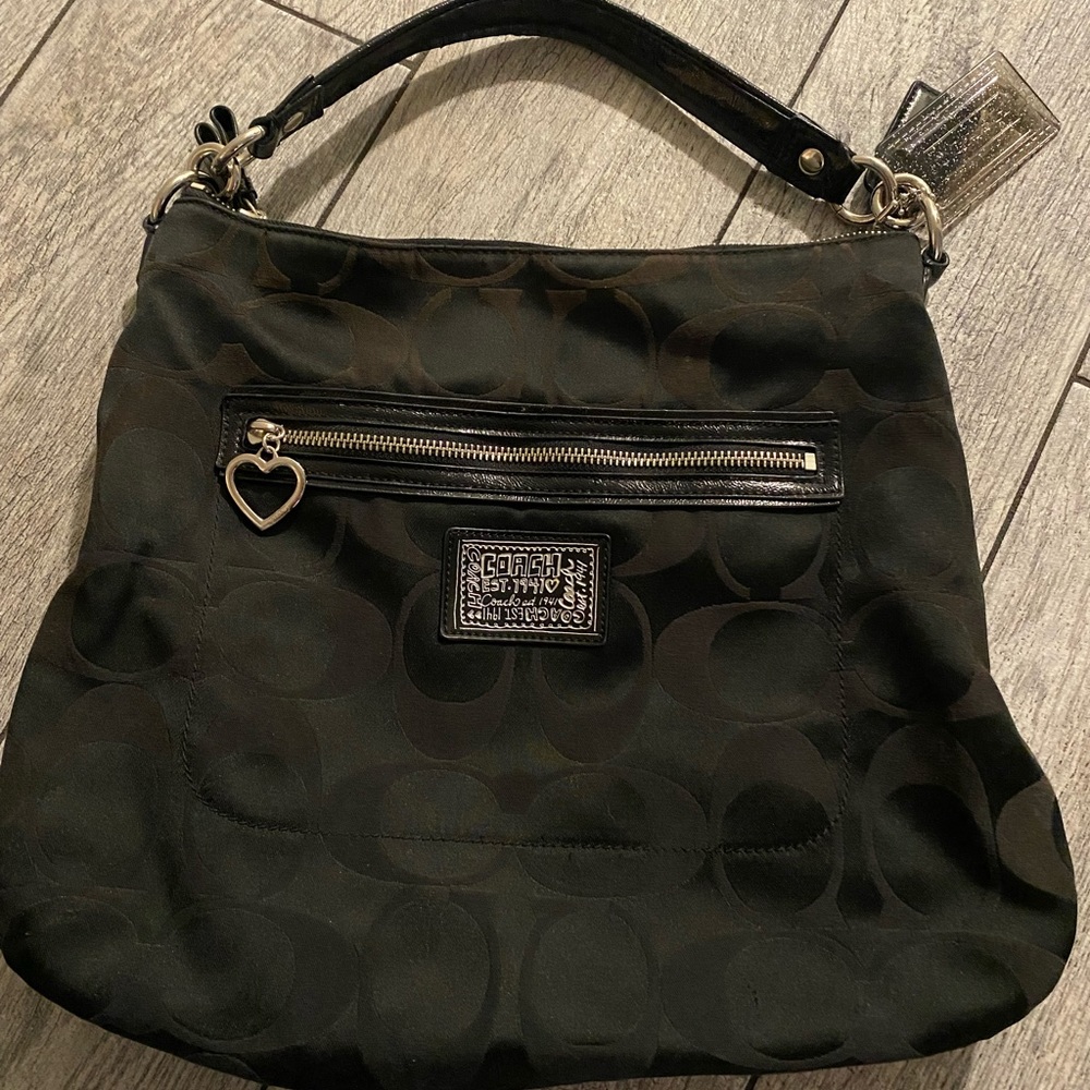 Black Coach purse 
Great condition!
No tears or rips 
Black inside